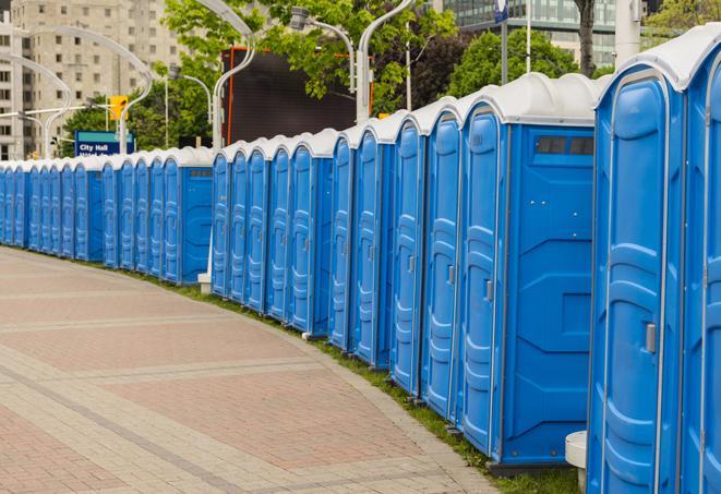 a line of portable restrooms at a sporting event, providing athletes and spectators with clean and accessible facilities in Bloomington CA